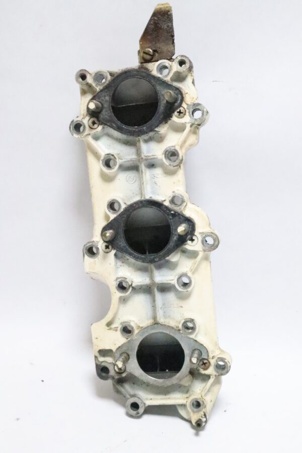 Evinrude 70hp 2 stroke outboard intake manifold with reeds (323689) | Used